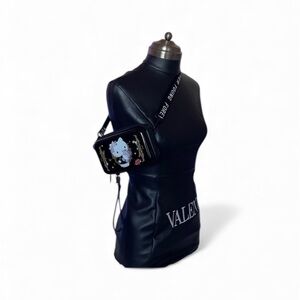 Forever young  Black mini bag  with White and red details and a character NWOT